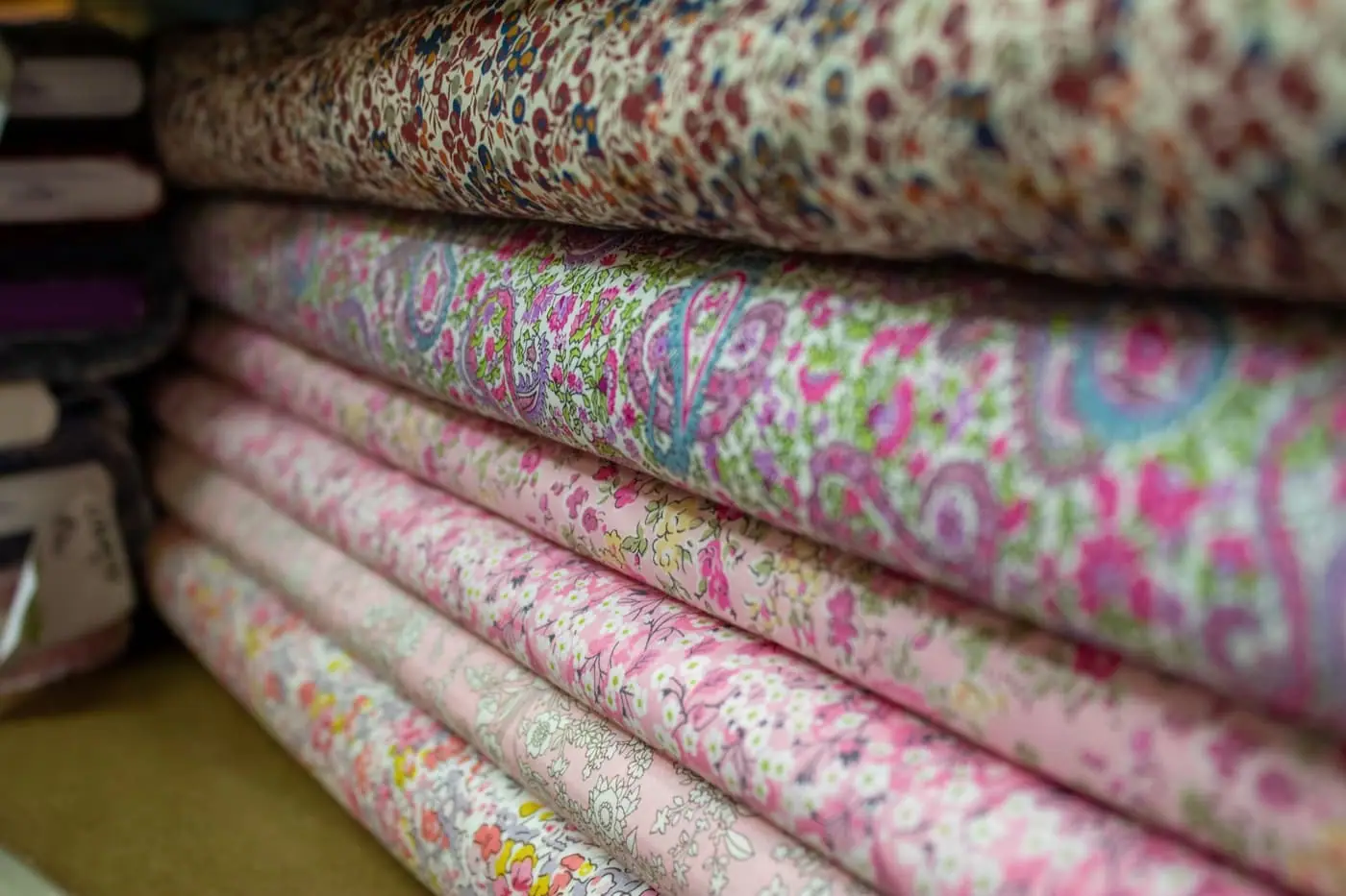 Rolls of printed fabric in the studio